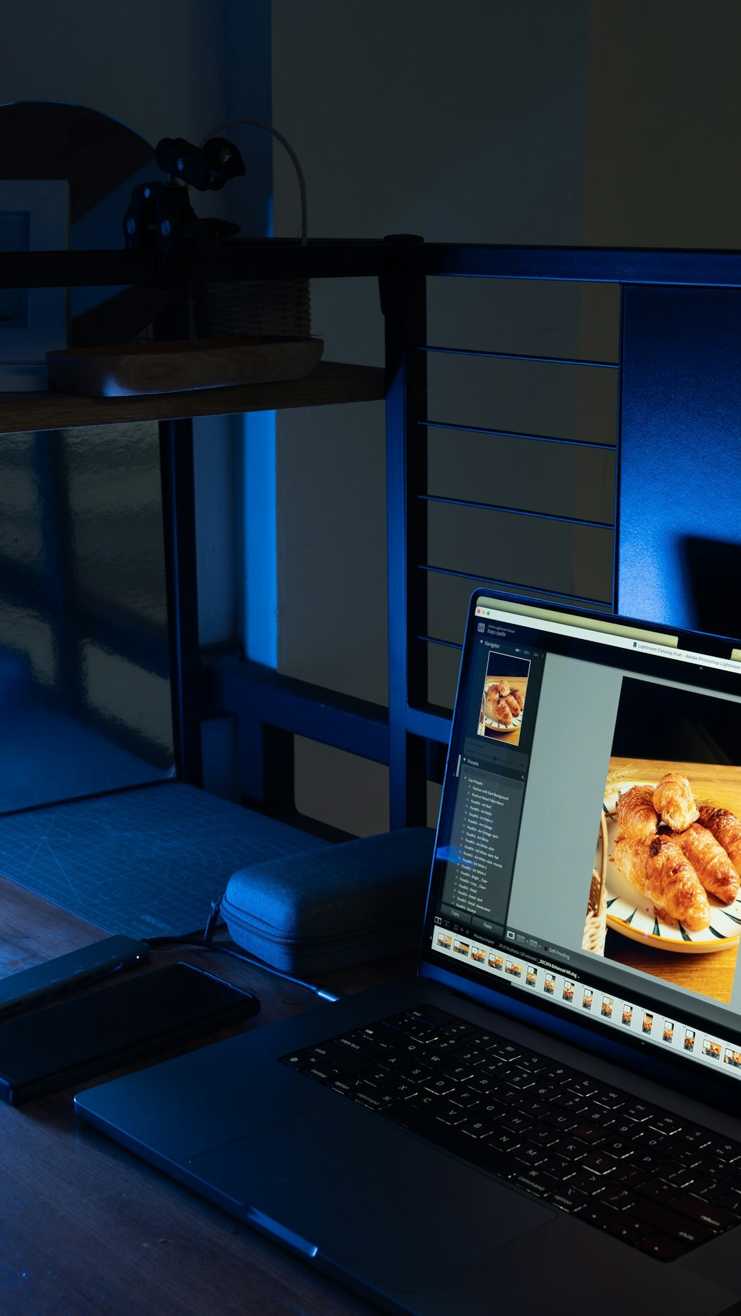 filmmaker editing video on laptop